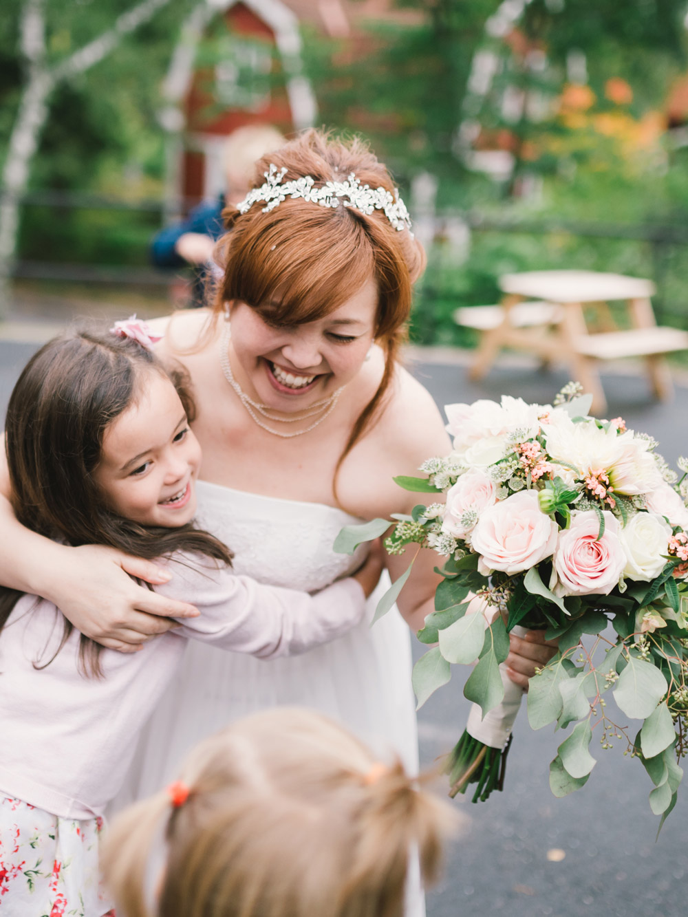 brid is hugging child